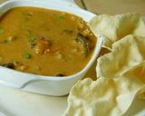 A picture of step 3 of Vaththal kuzhambu with brinjal and sundaikkai vaththals.