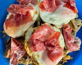 A picture of step 5 of Fried Artichokes with Eggs and Iberian Ham.