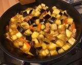 Une image de l'étape 13 de Aubergines, carottes et ciboules au lard et curry.