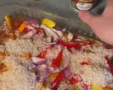 A picture of step 3 of One Pan Spicy Chicken, Veggie and Rice Bake.