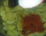 A picture of step 4 of Poori wali aloo ki tarkari.