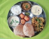 A picture of step 10 of Traditional Gujarati Thali.