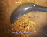 A picture of step 2 of Langer dal with tandoori roti in kadai.