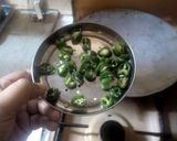 A picture of step 10 of Aloo Qeema.