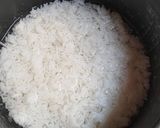 A picture of step 1 of Rice Cake (Lontong) with Rice Cooker.