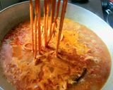 A picture of step 3 of Sev tamatar sabji.