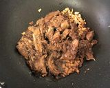A picture of step 2 of Filipino Chicken Adobo Fried Rice.