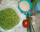 A picture of step 1 of Turmeric rice and peas.