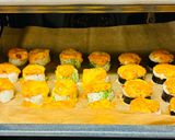 A picture of step 12 of Baked rolls under a cheese cap.