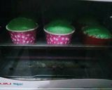 A picture of step 9 of Spinach cupcakes with egg and chocolate ganache topping.