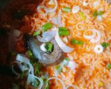 A picture of step 7 of Coconut jollof rice.