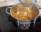 Foto del paso 7 de la receta: Rape en salsa de zanahorias, langostinos y arándanos