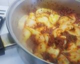 A picture of step 11 of Squid rings pillaw.