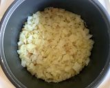 A picture of step 4 of Abura-age (Fried Thin Tofu) & Cabbage Takikomigohan.