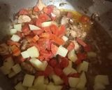 A picture of step 4 of Vegetable chicken pulao.