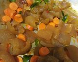 A picture of step 4 of Sweet potatoes with pomo,carrots and green pepper.