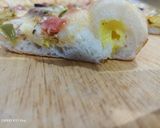 A picture of step 4 of Corners Cheese filled pizza.