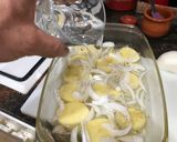 Foto del paso 4 de la receta: Filetes de lubina al horno con cebolla patata tomate natural y aderezo Vidalim
