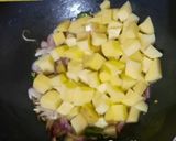 A picture of step 5 of Aloo Poha (Potato with Flattened Rice Pulao).