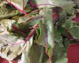 A picture of step 1 of Warm Beet Top Salad.