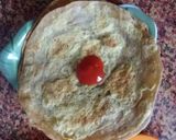 A picture of step 5 of Egg wrap with veggies.