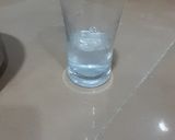 A picture of step 6 of Badaam pink lady shake.