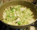 A picture of step 3 of Stir fry cabbage with coconut.
