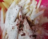 A picture of step 3 of Masala fries.