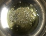 A picture of step 2 of Baingan bharta with green peas.