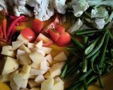 A picture of step 4 of Pumpkin Puri with mixed vegetable bhaji.