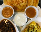 A picture of step 1 of Chana Chola, omellete and paratha.