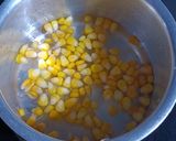 A picture of step 1 of Sweet corn chat in cucumber boat.