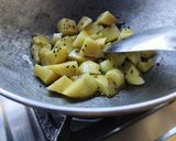 A picture of step 2 of Pumpkin ki sabji.