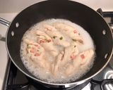 A picture of step 5 of Pan-fried hotdog & spring onion rolls.