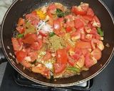 A picture of step 3 of Bitter gourd with chana dal masala.