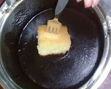 A picture of step 13 of Australian cake.. chocalate toping on vanilla cake.