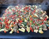 Une image de l'étape 10 de Bœuf aux poivrons, courgettes et tomates.