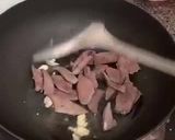 A picture of step 4 of Stir-Fried Pork Liver with Oyster Sauce and Crispy Garlic.