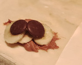 Foto del paso 4 de la receta: Dulce de plátano con masa filo🍌🥜🍫