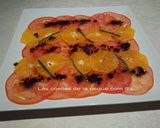 Foto del paso 3 de la receta Carpaccio de tomate y naranja con vinagreta de ajo negro
