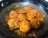 A picture of step 7 of Spicy baby potatoes.