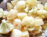 A picture of step 1 of Cauliflower with Potato sabji Gobhi ki sabji.
