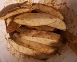 A picture of step 3 of Wedged potato jackets served with veges.