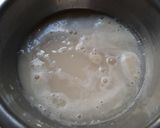 A picture of step 2 of Pita Bread Chick Pea Kidney bean filling with Tzatziki sauce.