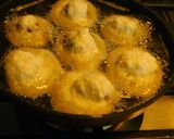 A picture of step 3 of Spicy appam stuffed with masala potato.