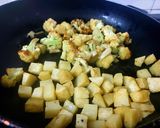 A picture of step 1 of Cauliflower Potato Peas Dry Vegetable or Sabzi.