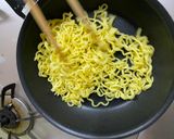 A picture of step 2 of Omu-Okonomiyaki (Japanese as-you-like pancake wrapped with egg).