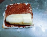 A picture of step 3 of Delicious tasty banana nutella bread roll.