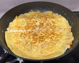 A picture of step 15 of Enoki Mushroom Omelette.