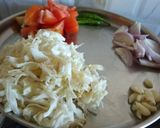 A picture of step 2 of Tomato cabbage bharta.
